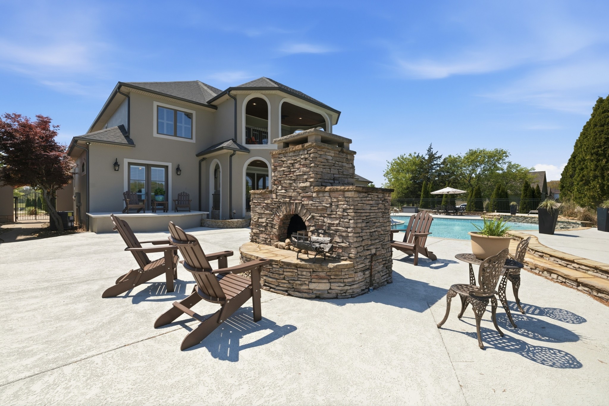 4606 Shores Road Murfreesboro, TN 37128 - Photo 56 of 74 a view of a patio with a table and chairs