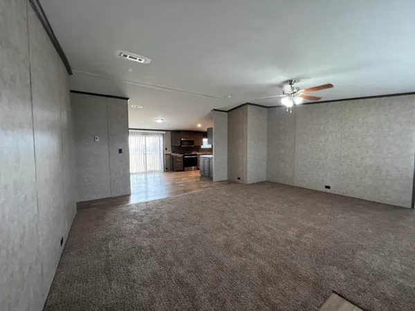 a view of a hallway with a stove