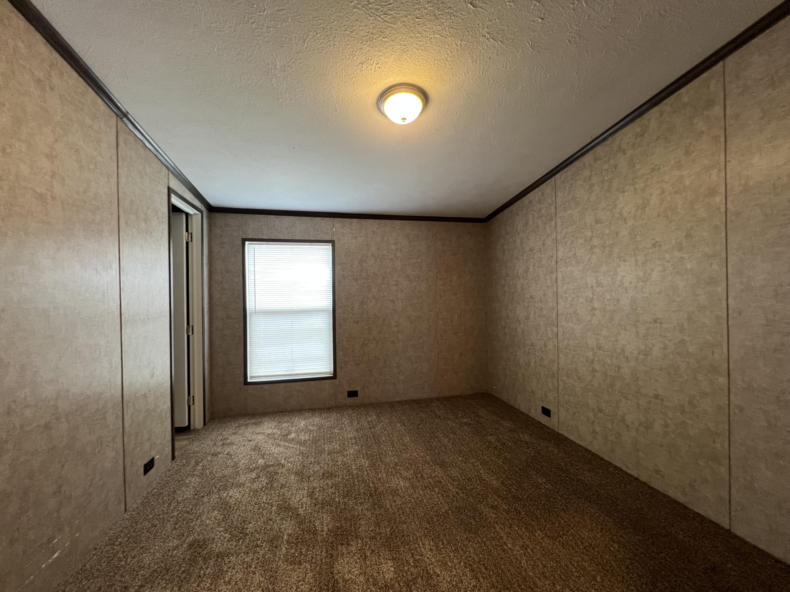 516 May Street Post, TX 79356 - Photo 26 of 31 a view of an empty room and window
