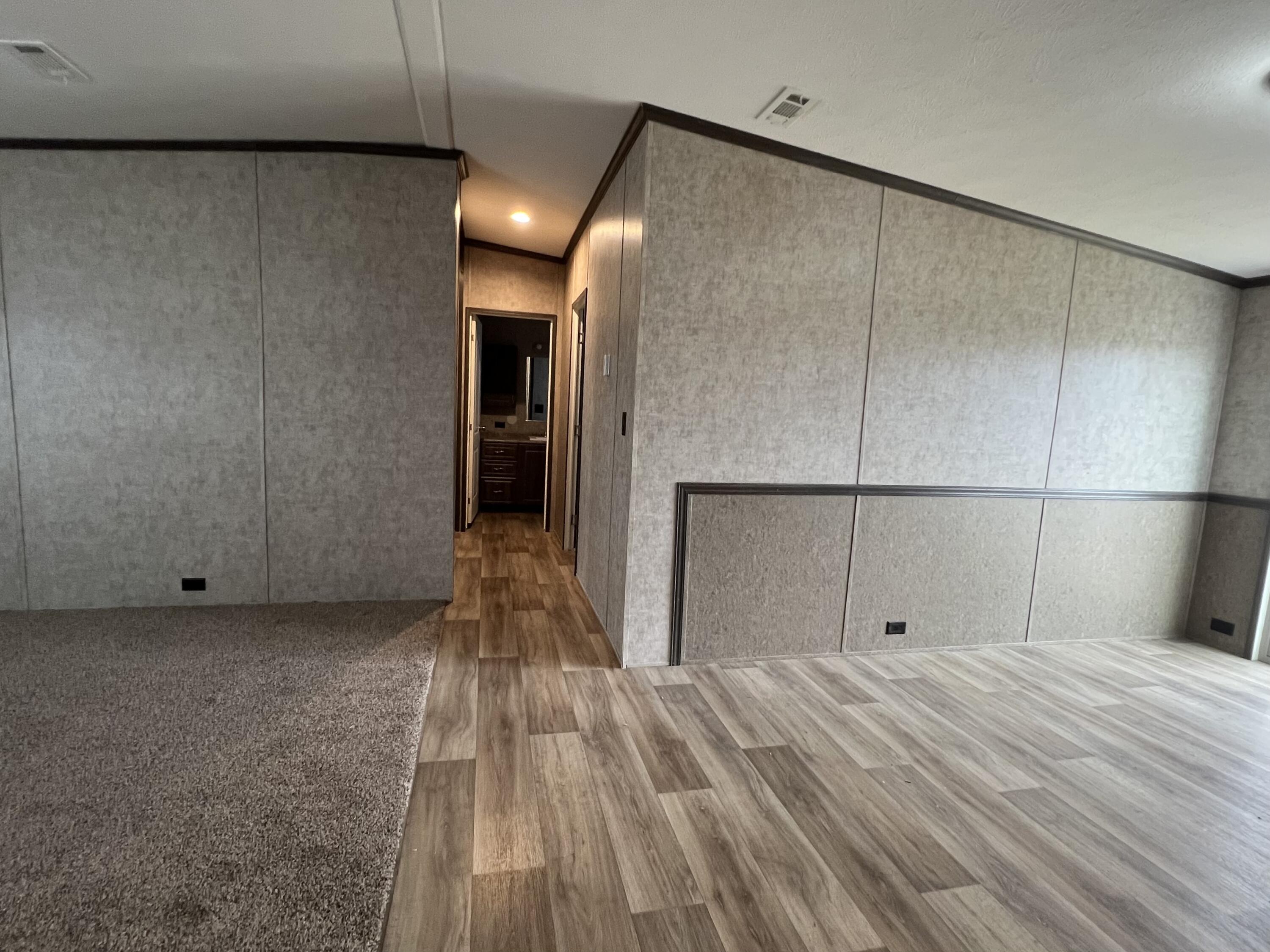 516 May Street Post, TX 79356 - Photo 10 of 31 a view of empty room with wooden floor