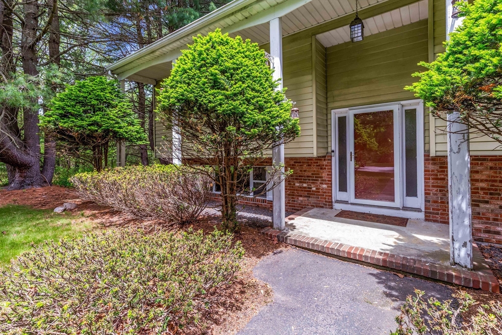 15 Conestoga Road Lexington, MA 02421 - Photo 2 of 31 a front view of a house with a yard