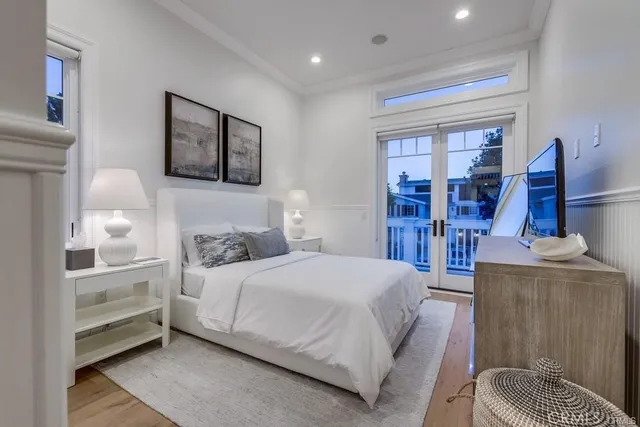 a view of a balcony with wooden floor