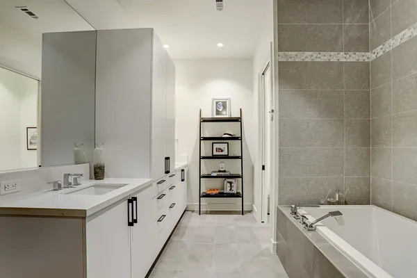 a bedroom with a bed and a television