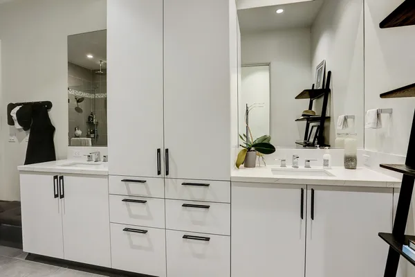 a bathroom with a bathtub and a sink