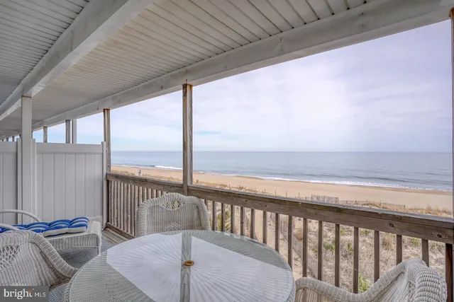 a view of balcony with furniture