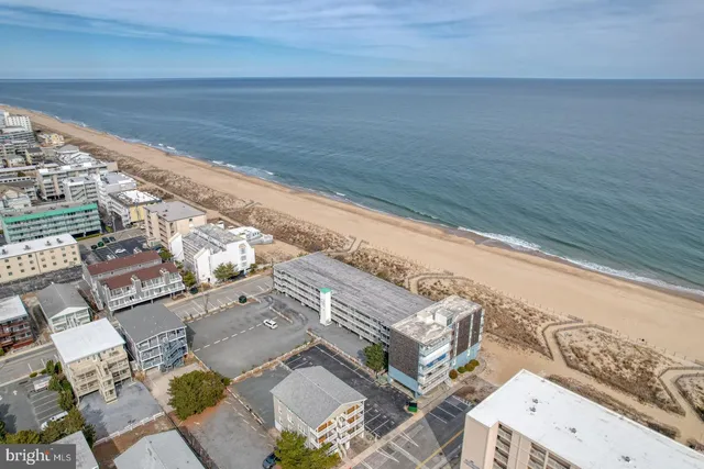 a view of residential houses with outdoor space