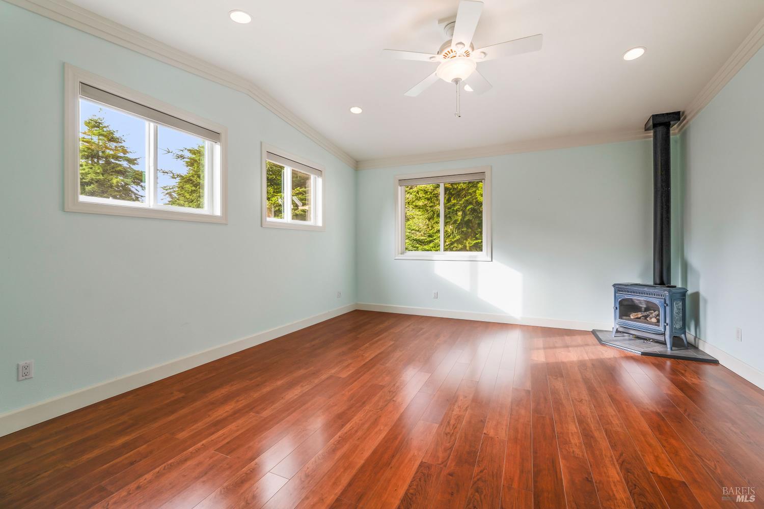 16611 Pearl Ranch Road Fort Bragg, CA 95437 - Photo 42 of 71 a view of an empty room with a window and wooden floor