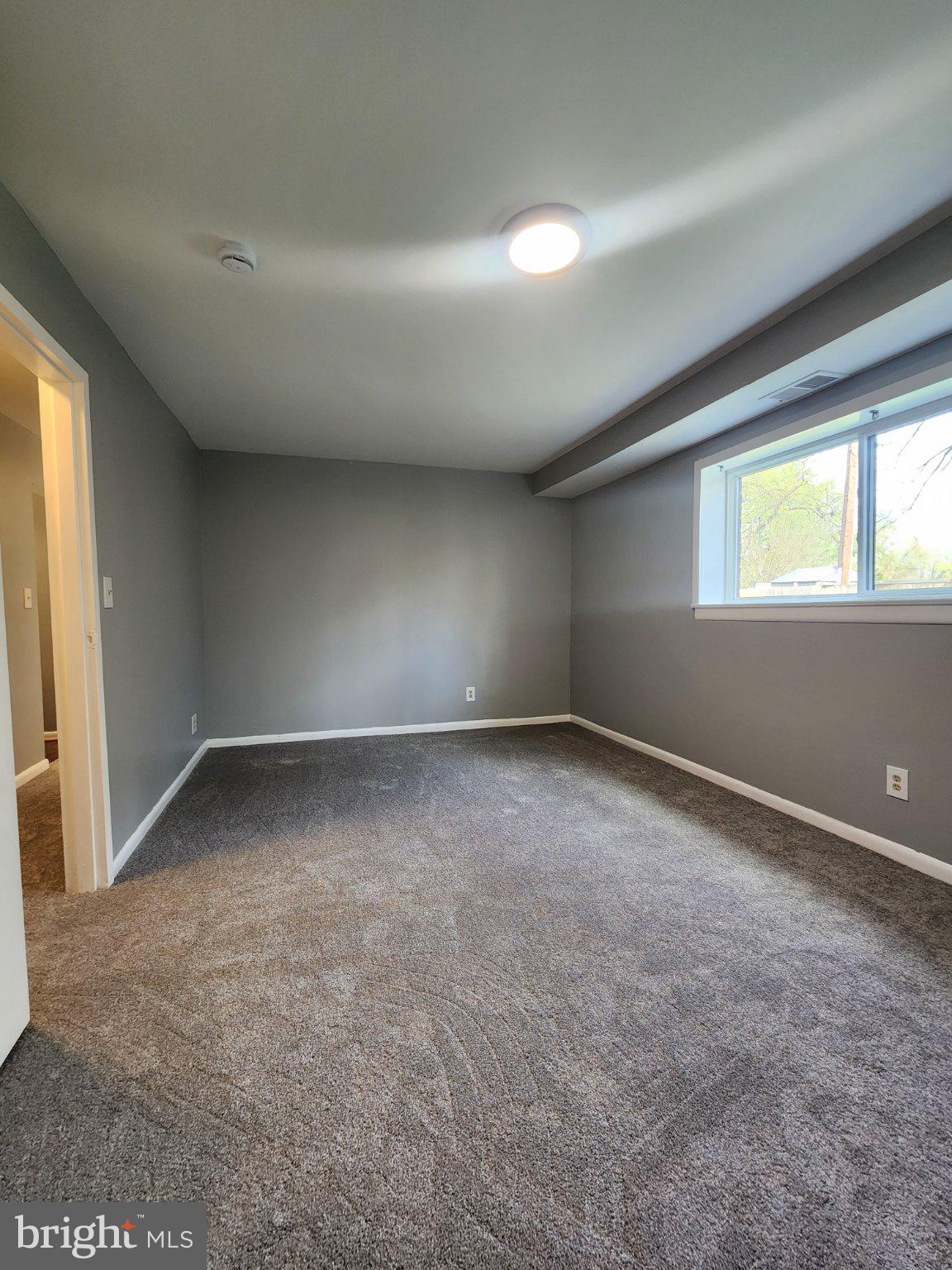 207 Erin Way, Unit T4 Reisterstown, MD 21136 - Photo 17 of 28 Large bedroom with replacement window.