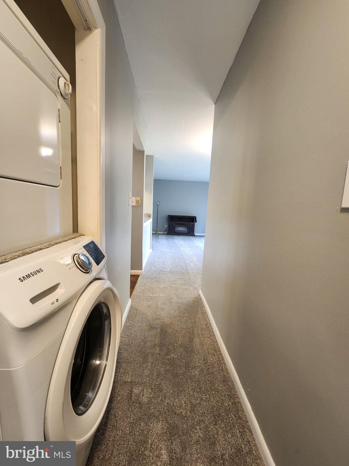 207 Erin Way, Unit T4 Reisterstown, MD 21136 - Photo 20 of 28 Bright hallway with laundry convenience.