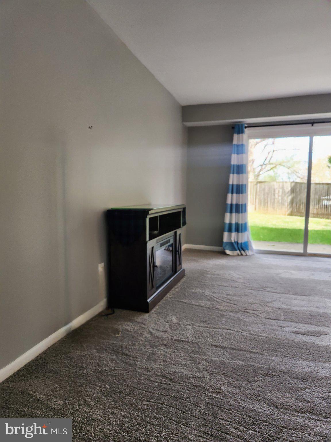 207 Erin Way, Unit T4 Reisterstown, MD 21136 - Photo 22 of 28 New sliding door exits at ground level.