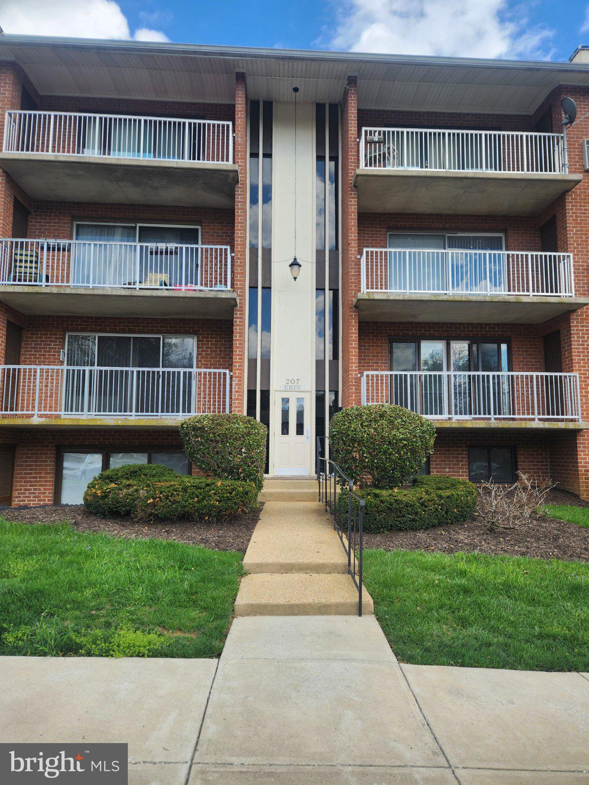207 Erin Way, Unit T4 Reisterstown, MD 21136 - Photo 24 of 28 Charming brick condo facade.
