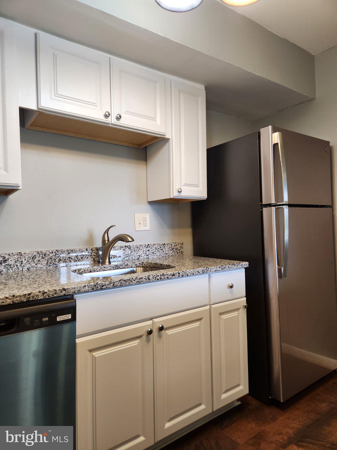 207 Erin Way, Unit T4 Reisterstown, MD 21136 - Photo 9 of 28 Modern kitchen with sleek finishes.