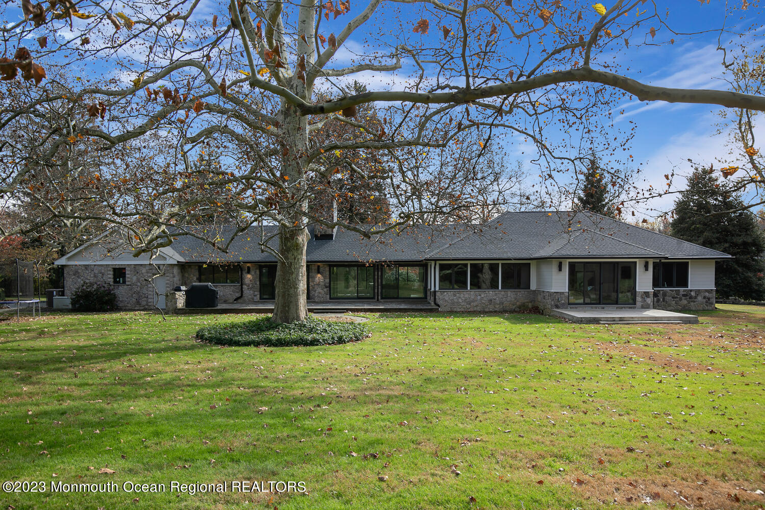 166 Rumson Road Rumson, NJ 07760 - Photo 2 of 46 a house view with a sitting space and garden