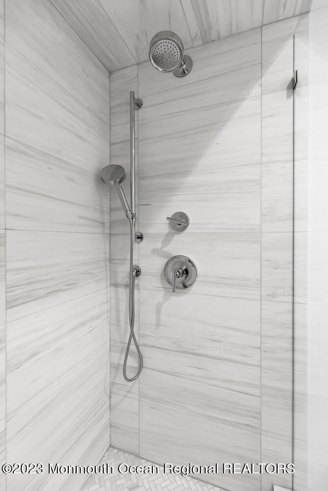 166 Rumson Road Rumson, NJ 07760 - Photo 24 of 46 a bathroom with a shower