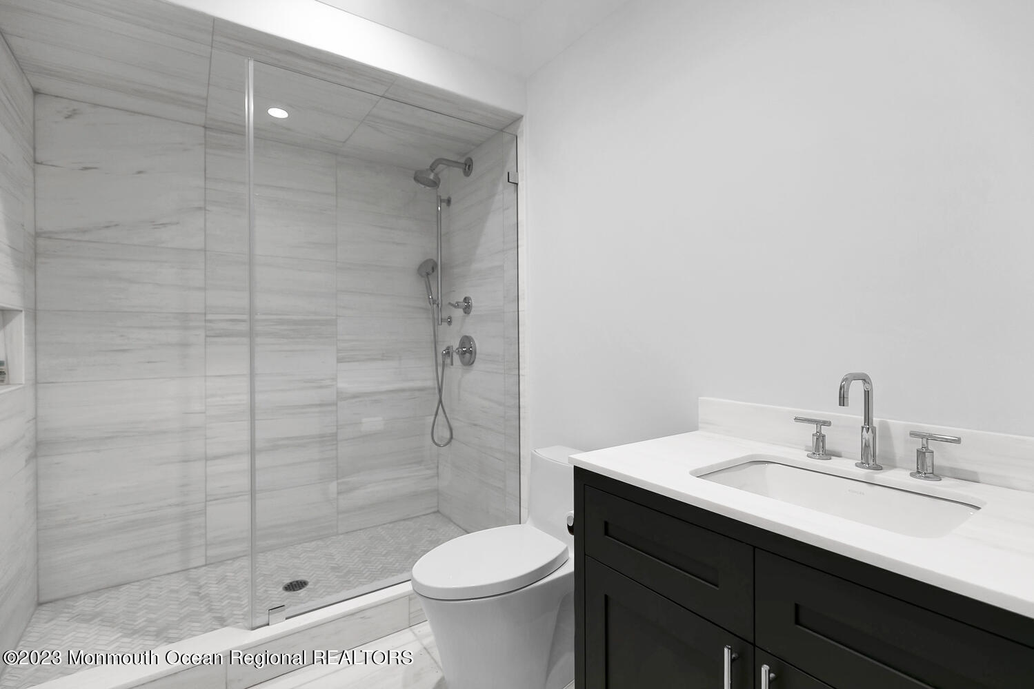 166 Rumson Road Rumson, NJ 07760 - Photo 30 of 46 a bathroom with a sink a toilet and shower