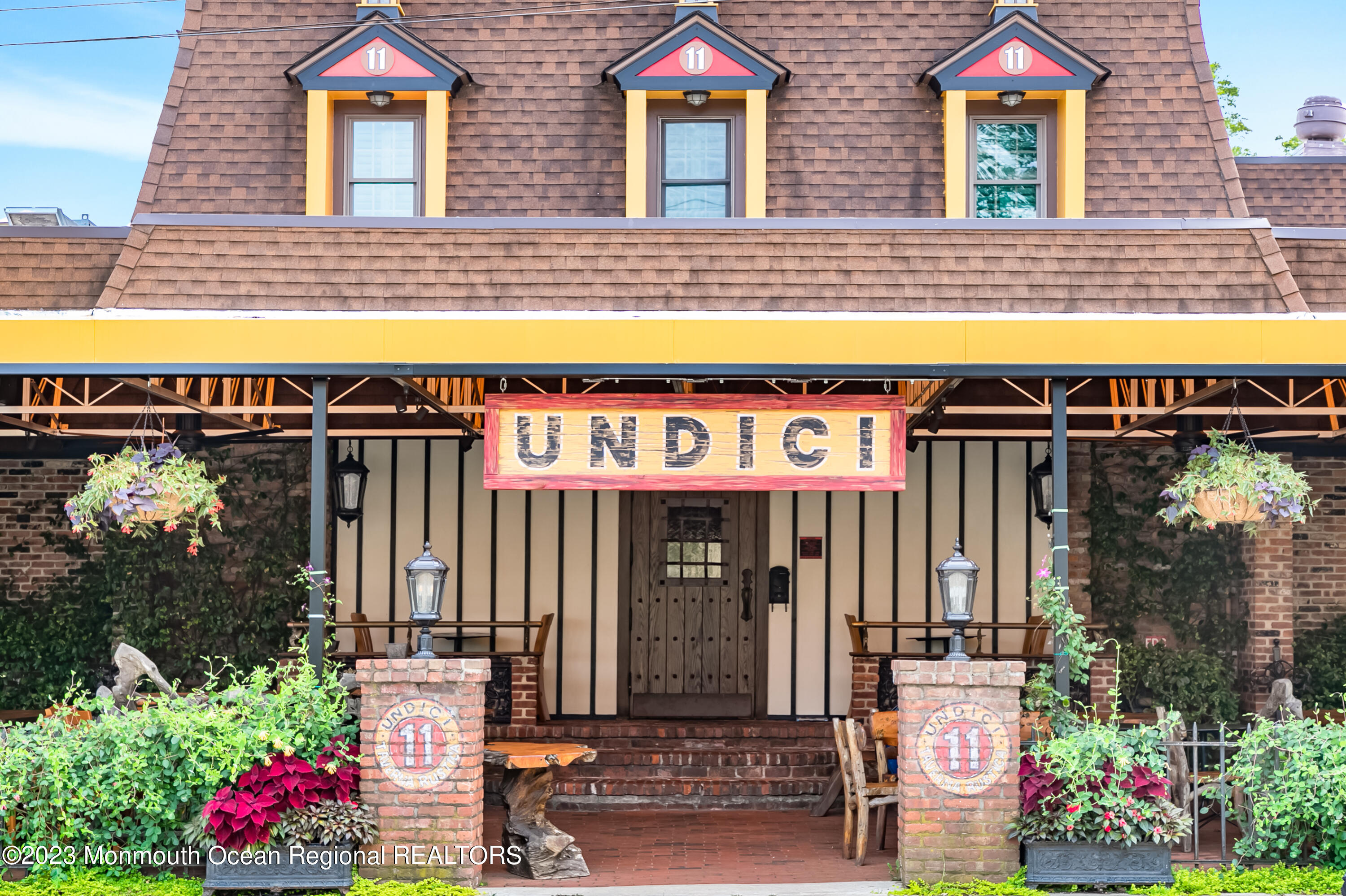 166 Rumson Road Rumson, NJ 07760 - Photo 37 of 46 a front view of a building with street