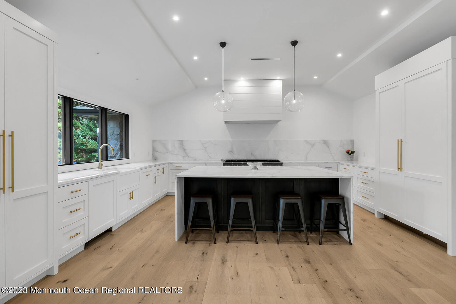 166 Rumson Road Rumson, NJ 07760 - Photo 5 of 46 a large white kitchen with a large window