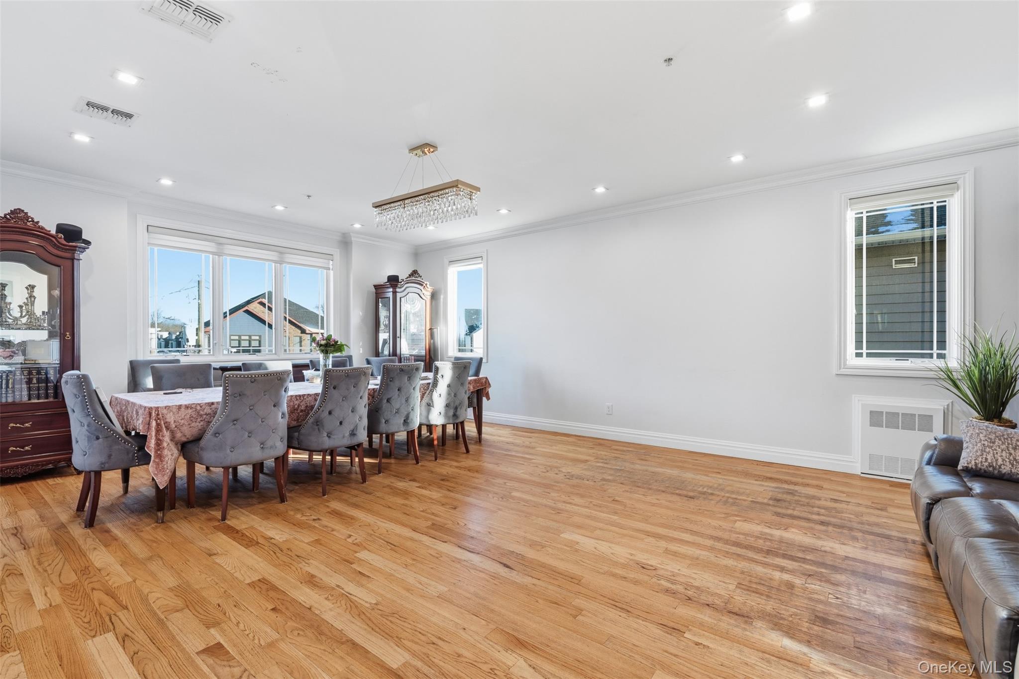 7 Park Street, Unit 301 Spring Valley, NY 10977 - Photo 14 of 33 a view of a dining room with furniture and wooden floor