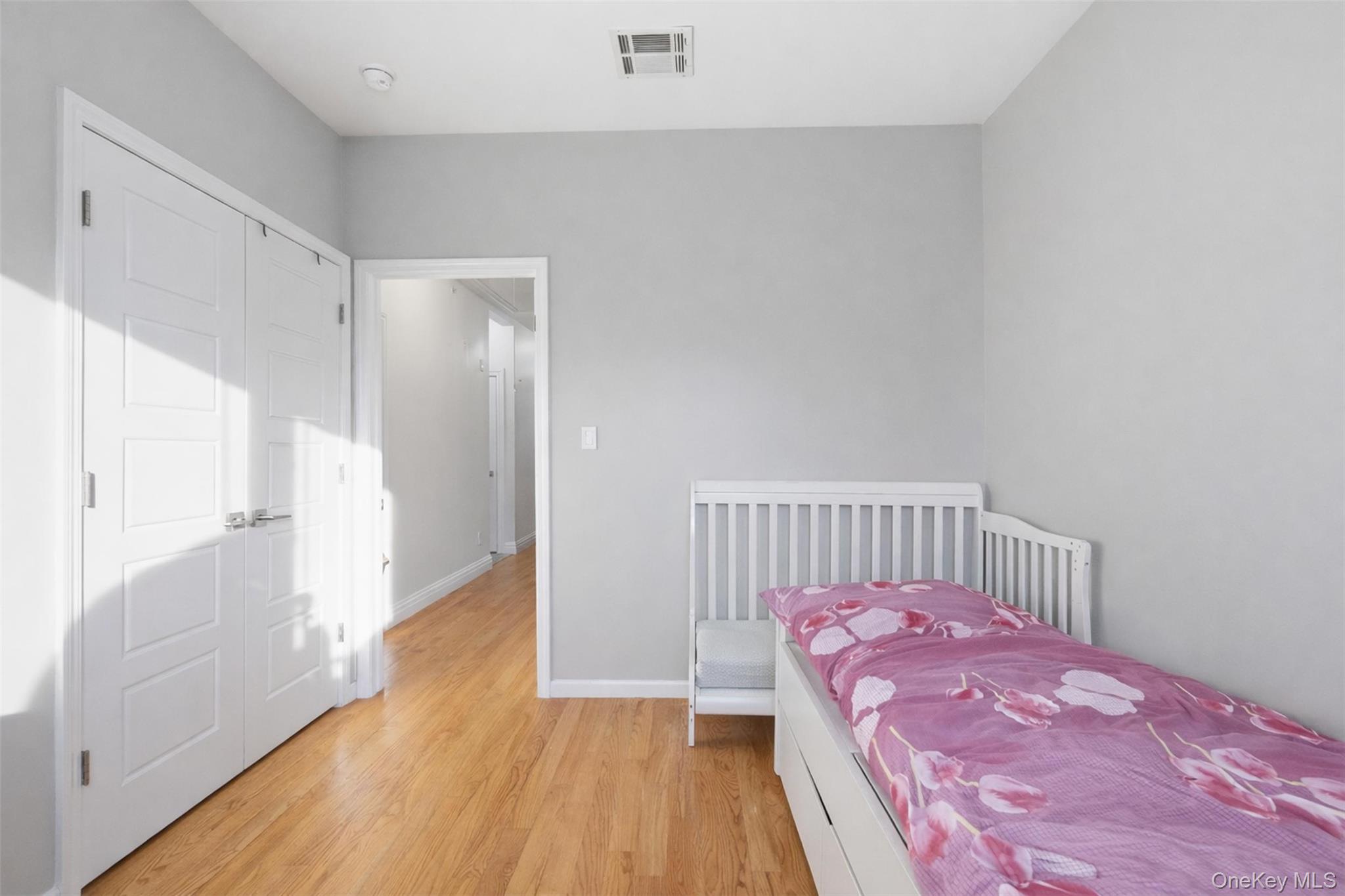 7 Park Street, Unit 301 Spring Valley, NY 10977 - Photo 29 of 33 a view of a hallway with wooden floor