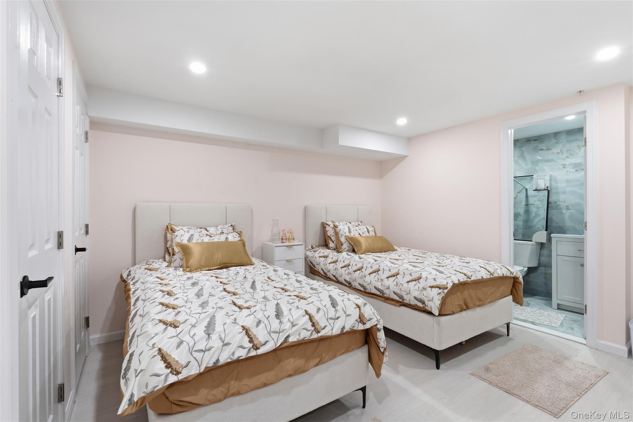 7 Park Street, Unit 301 Spring Valley, NY 10977 - Photo 32 of 33 a bedroom with two beds and painted walls