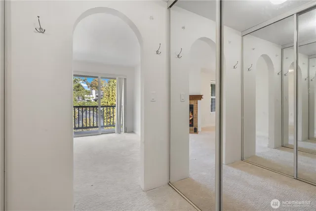 a view of a bathroom with a glass door and shower