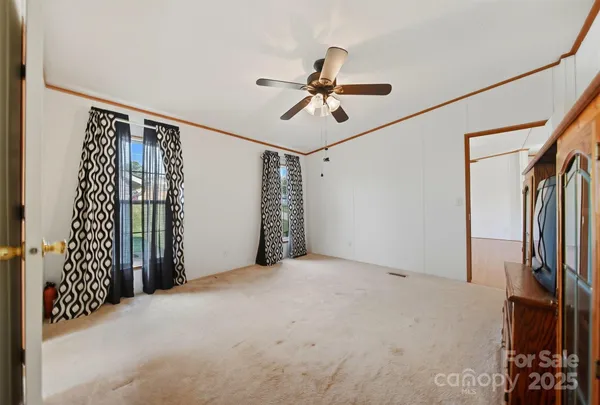 a view of a livingroom with a staircase