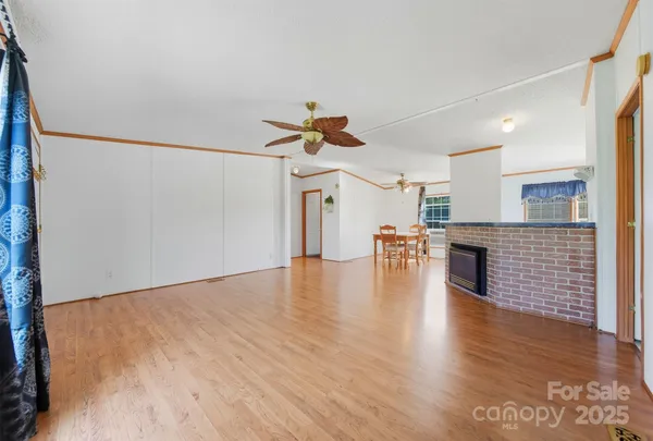 a view of a livingroom with wooden floor