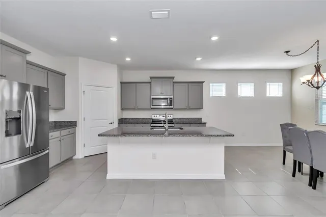 a bathroom that has a glass shower door