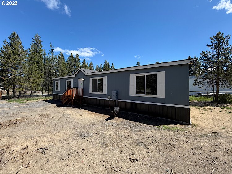 16125 Hawks Lair Road La Pine, OR 97739 - Photo 26 of 35 a front view of a house with a yard