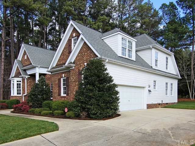 8604 Wapello Lane Raleigh, NC 27613 - Photo 25 of 25 Other details include: handsome hardwood flooring throughout main level; open floorplan; heavy molding throughout; laundry room; utility sink in oversized double garage; security system; half-moon transom windows; and a wonderful, quiet location!