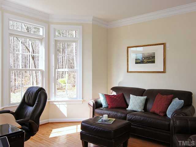 8604 Wapello Lane Raleigh, NC 27613 - Photo 3 of 25 Formal living room or study with bay window.