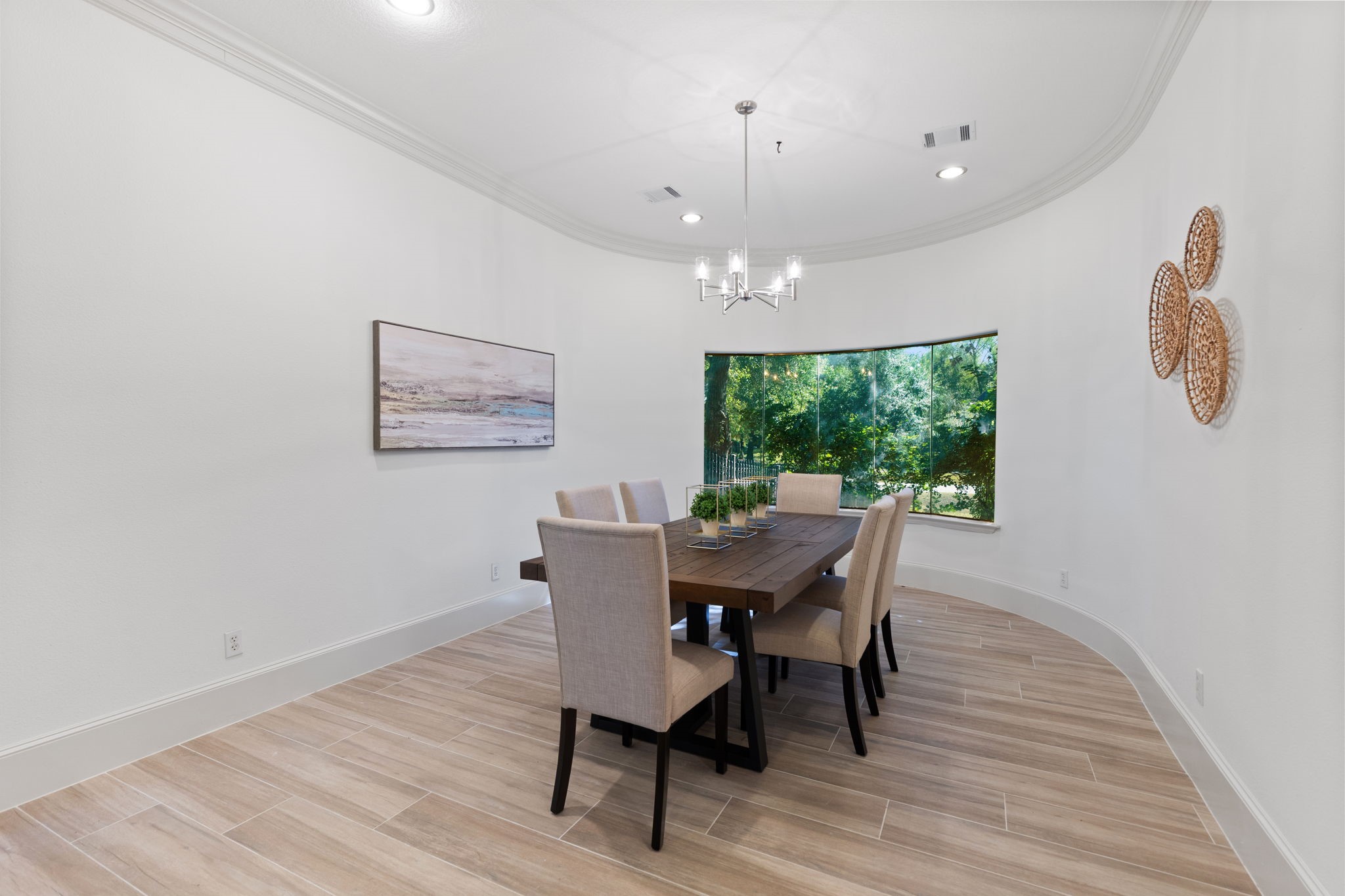 27502 Whispering Maple Way Spring, TX 77386 - Photo 16 of 46 a dining room with furniture a window and wooden floor