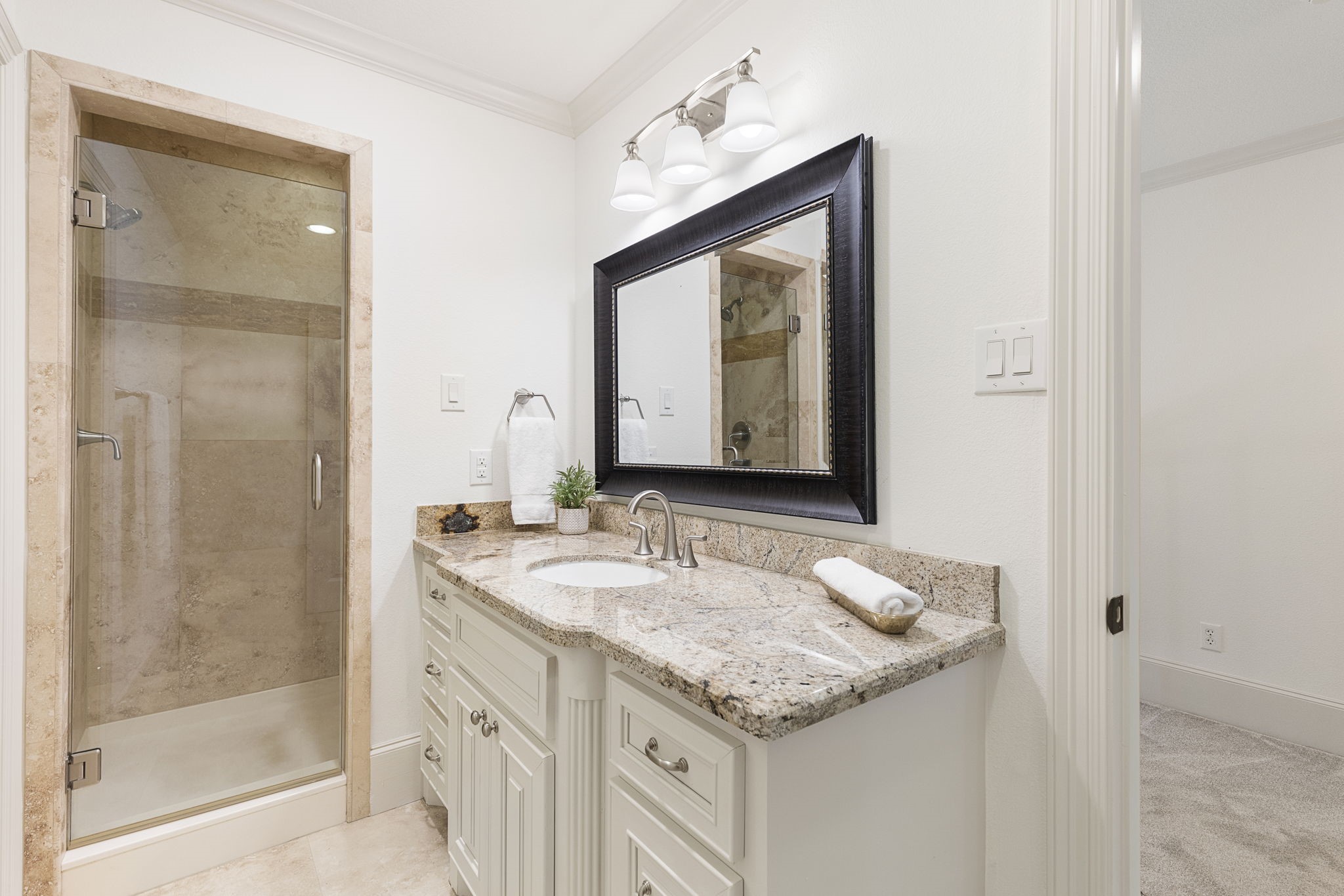 27502 Whispering Maple Way Spring, TX 77386 - Photo 29 of 46 a bathroom with a granite countertop sink and a mirror