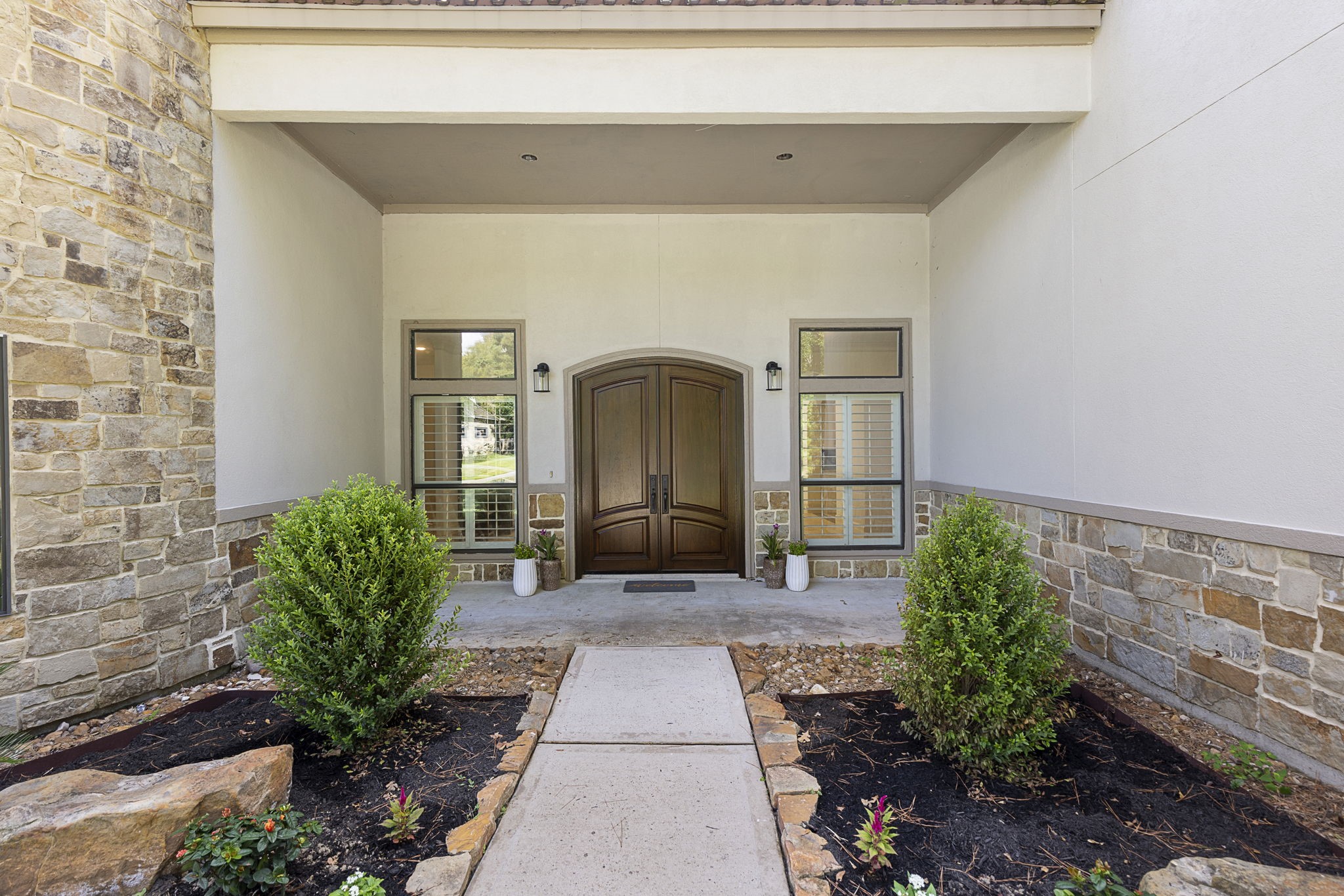 27502 Whispering Maple Way Spring, TX 77386 - Photo 3 of 46 a front view of a house with a yard