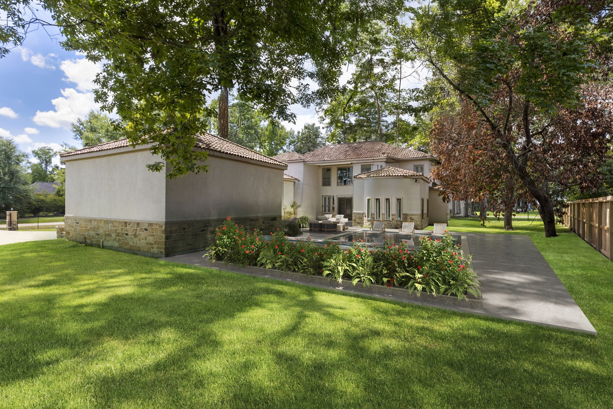 27502 Whispering Maple Way Spring, TX 77386 - Photo 36 of 46 a front view of a house with a garden