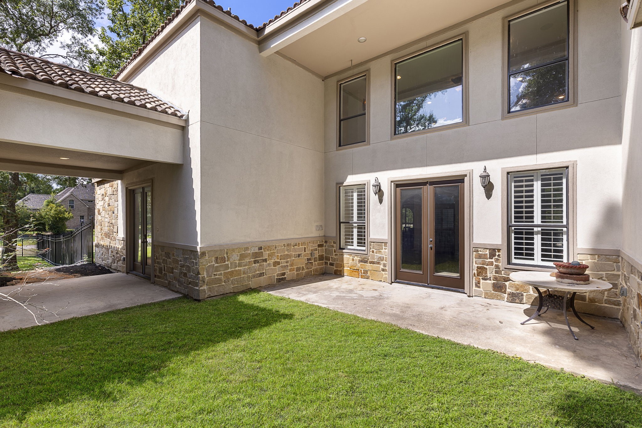 27502 Whispering Maple Way Spring, TX 77386 - Photo 37 of 46 Covered back patio off of Family Room French Doors. Short covered breezeway from Breakfast Room area to Garage.