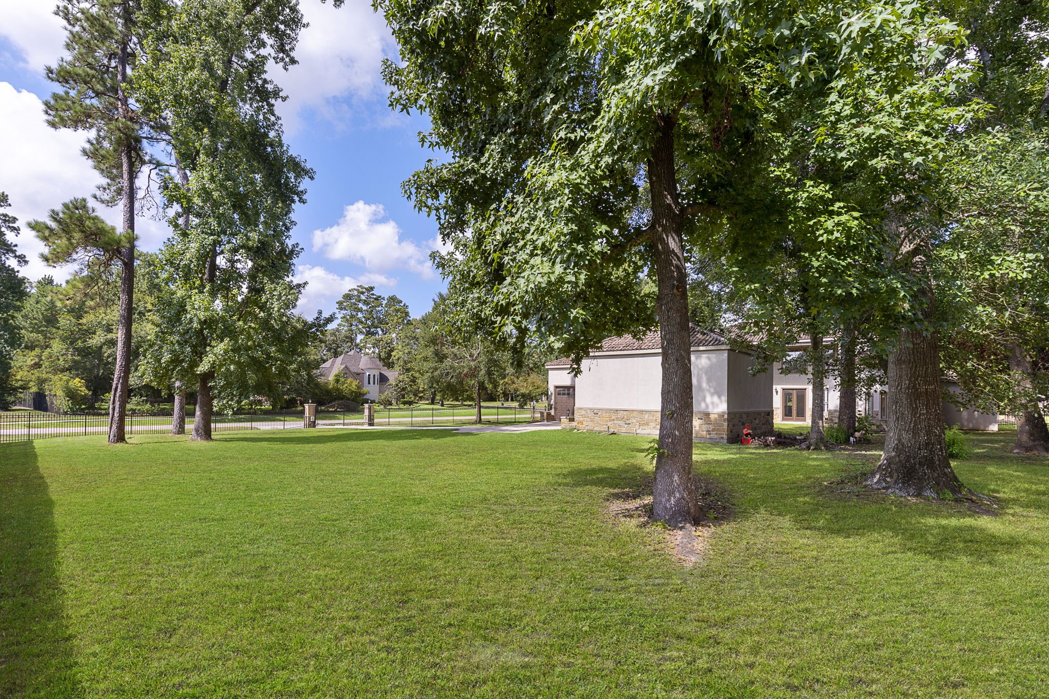 27502 Whispering Maple Way Spring, TX 77386 - Photo 40 of 46 Expansive backyard with endless possibilities—perfect for a playset, pool, outdoor kitchen, garden, and more!