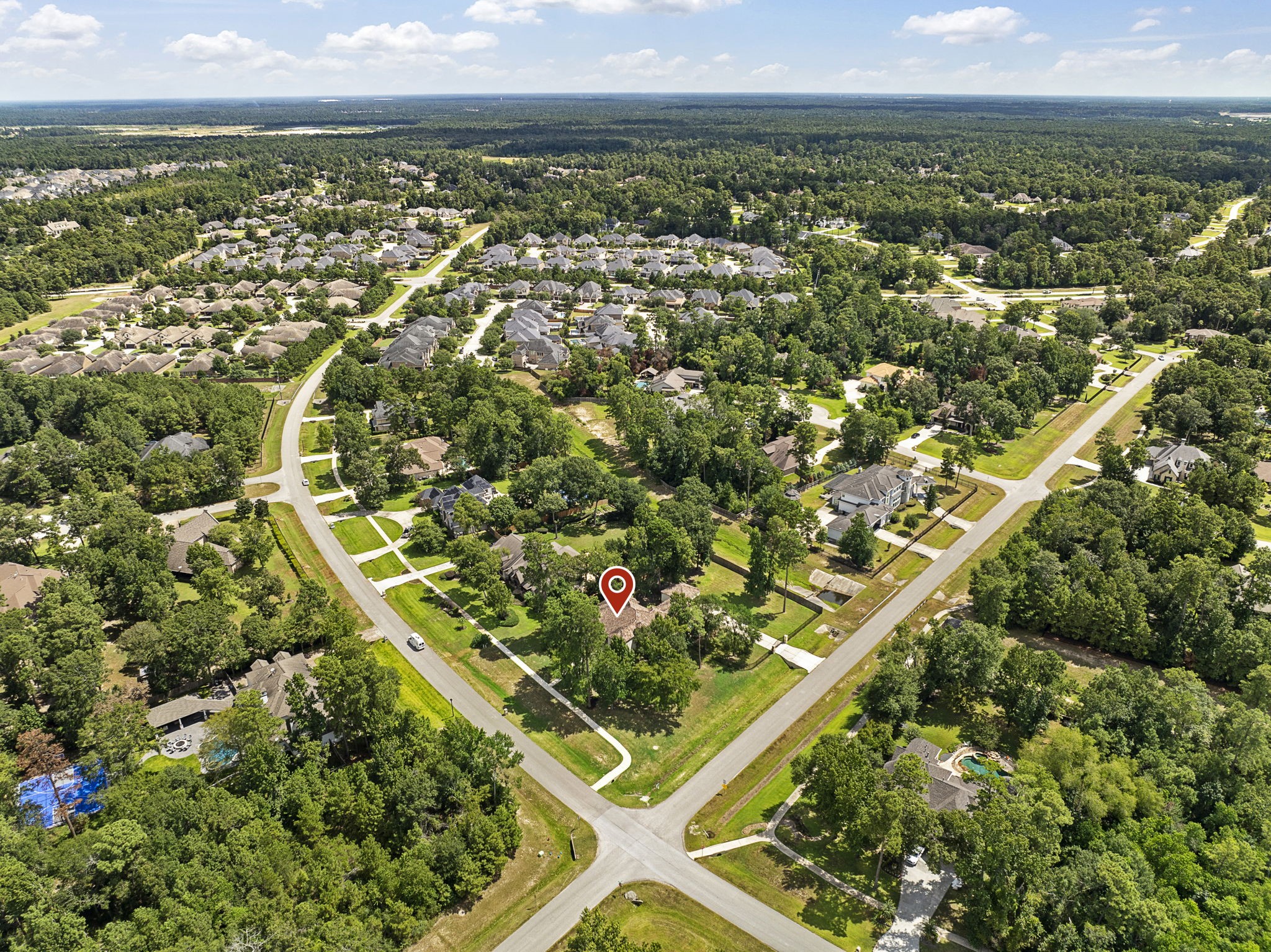 27502 Whispering Maple Way Spring, TX 77386 - Photo 42 of 46 an aerial view of residential houses with outdoor space