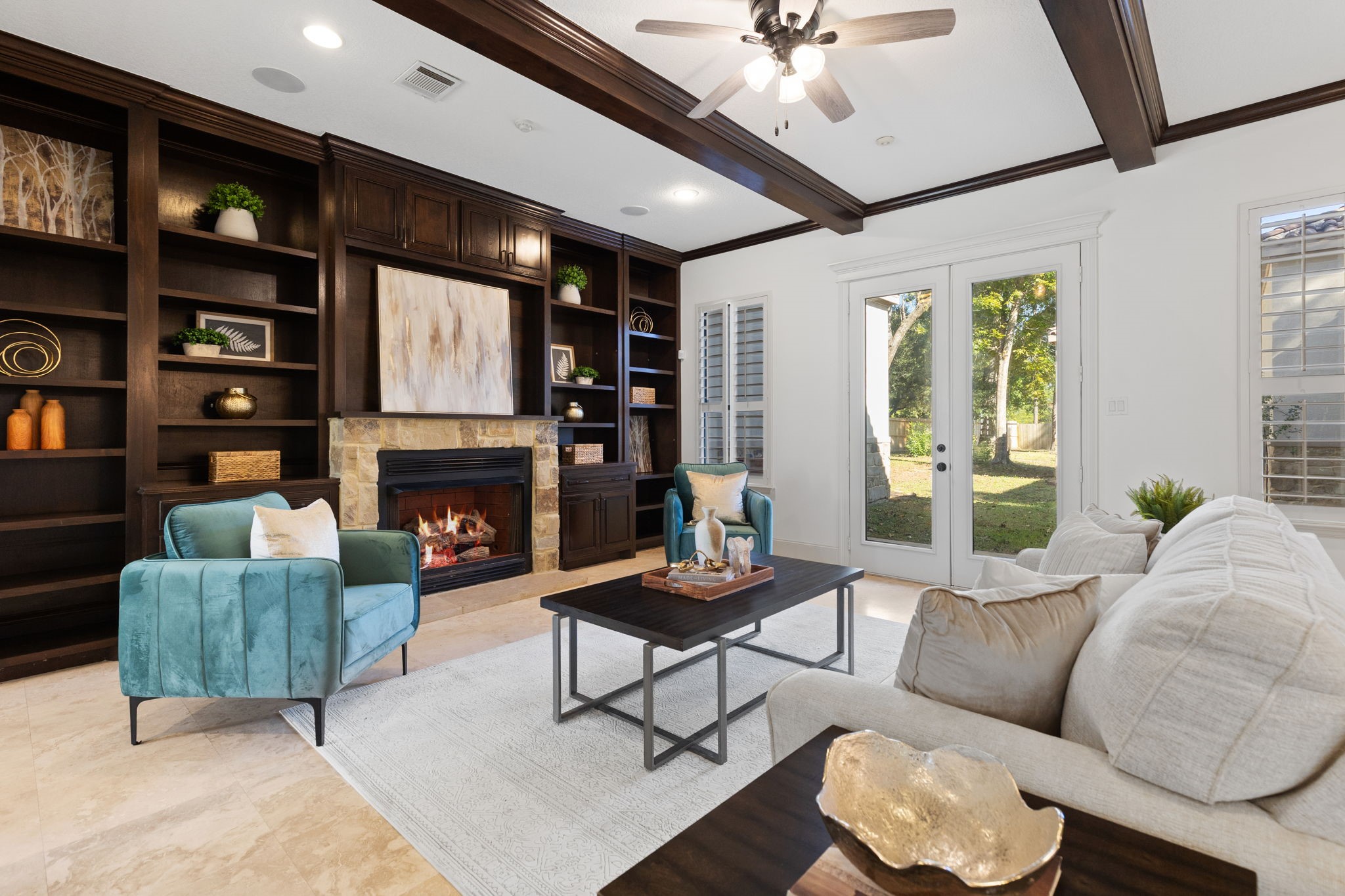 27502 Whispering Maple Way Spring, TX 77386 - Photo 9 of 46 a living room with furniture and a fireplace