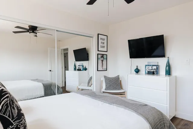 a bathroom with a granite countertop sink mirror and double