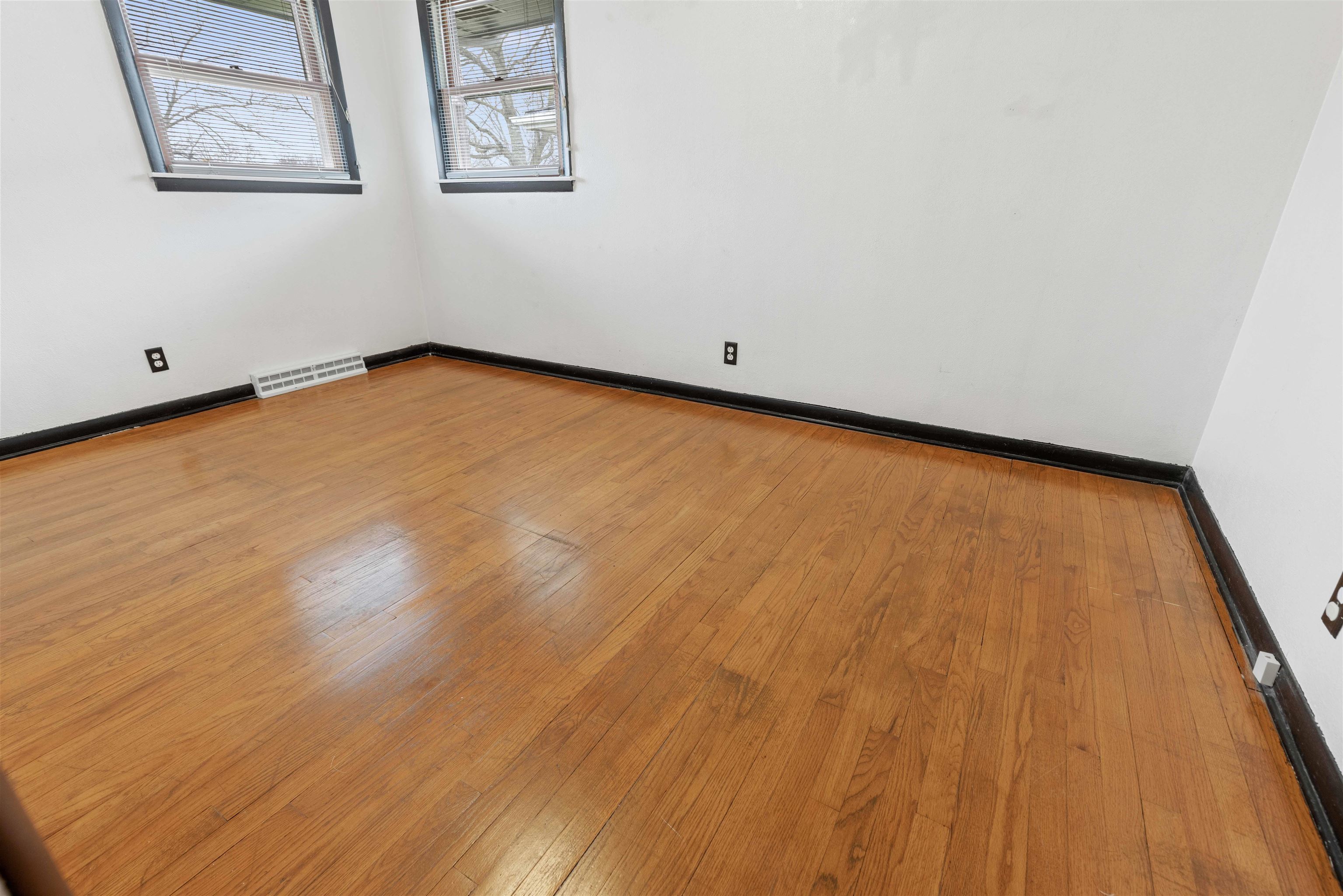 6949 Ralph Road Rockford, IL 61109 - Photo 8 of 27 a view of a room with wooden floor