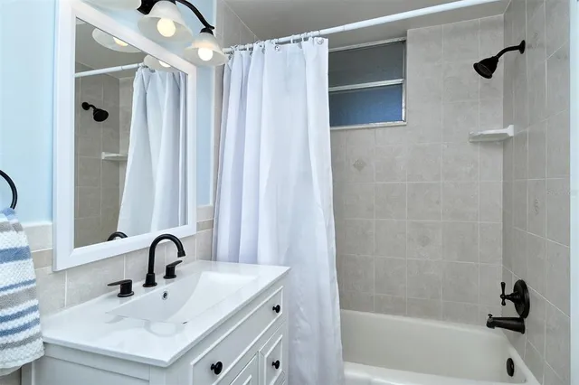 a bathroom with a sink and a tub