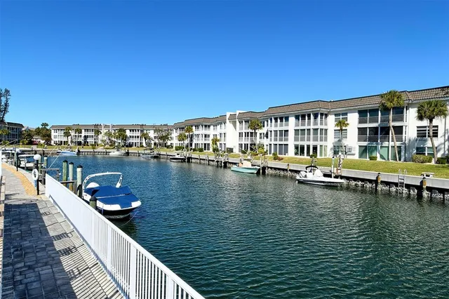 front view of a building with a tree