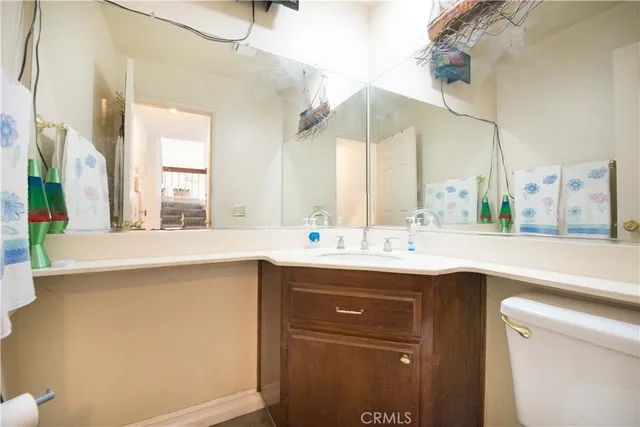 a kitchen with a sink and a window