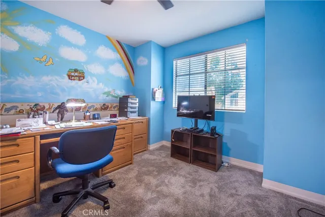 a room with furniture and a window