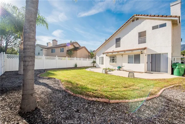 a view of a house with swimming pool