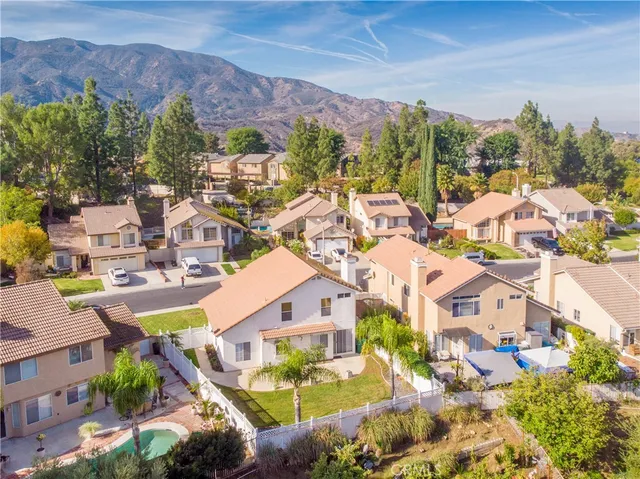 a view of a city with a mountain in the background