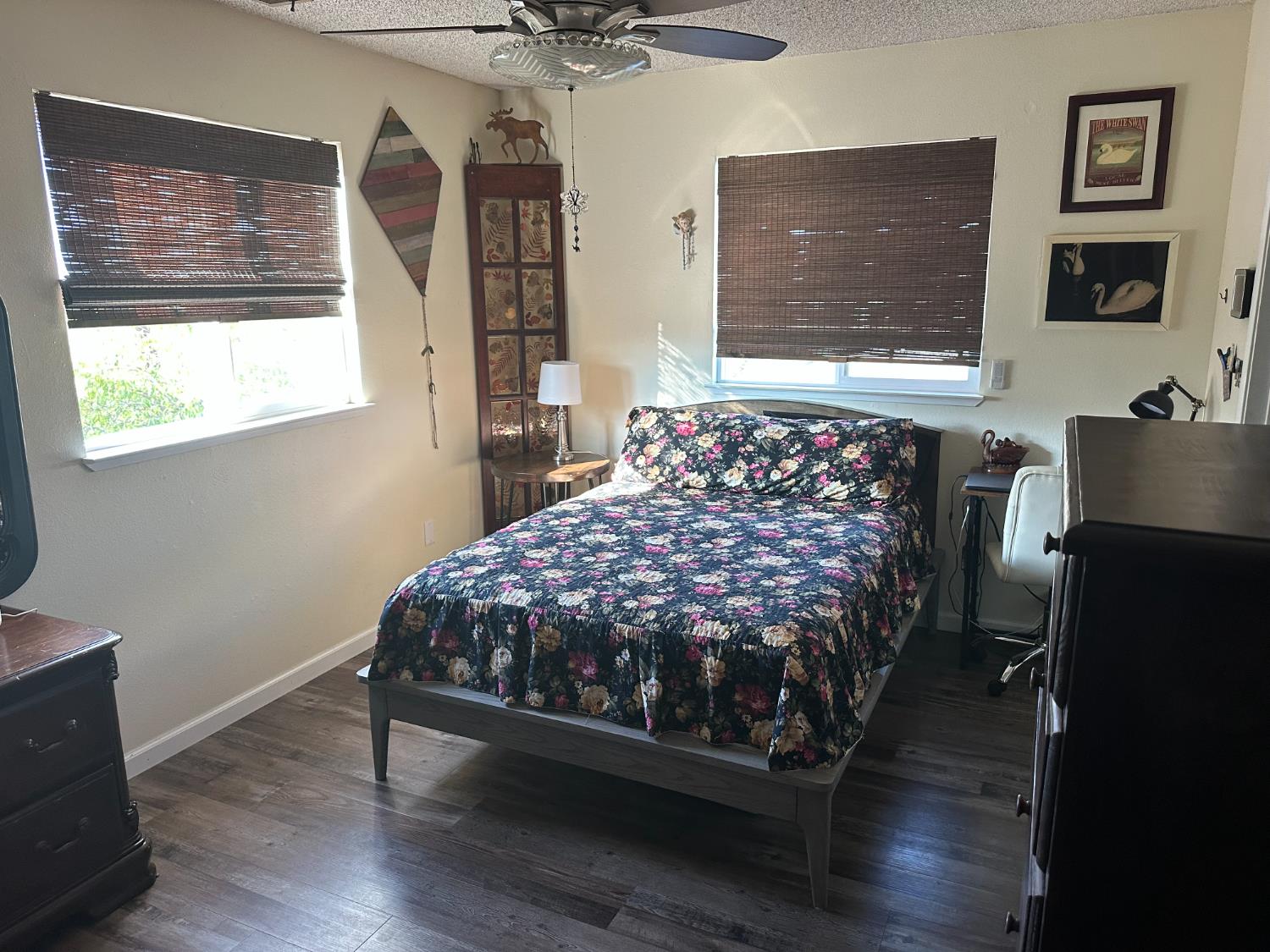 6186 Arena Way Livingston, CA 95334 - Photo 13 of 21 a bed sitting in a bedroom next to a window