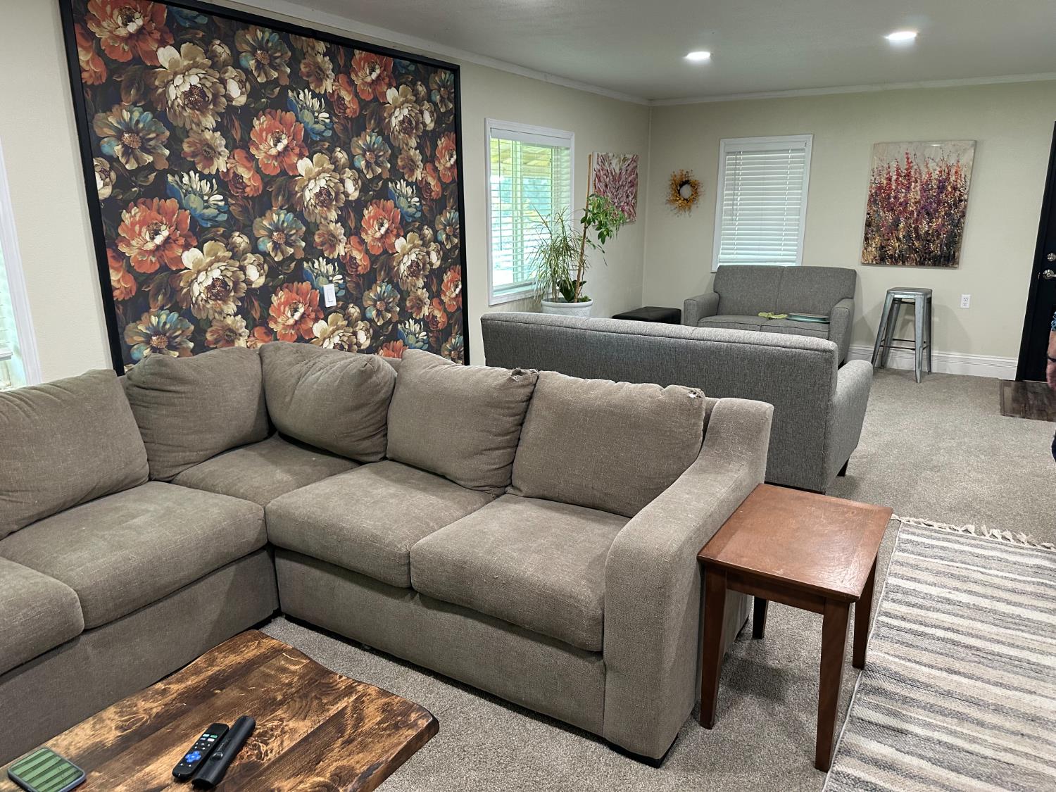 6186 Arena Way Livingston, CA 95334 - Photo 5 of 21 a living room with a couch and a potted plant