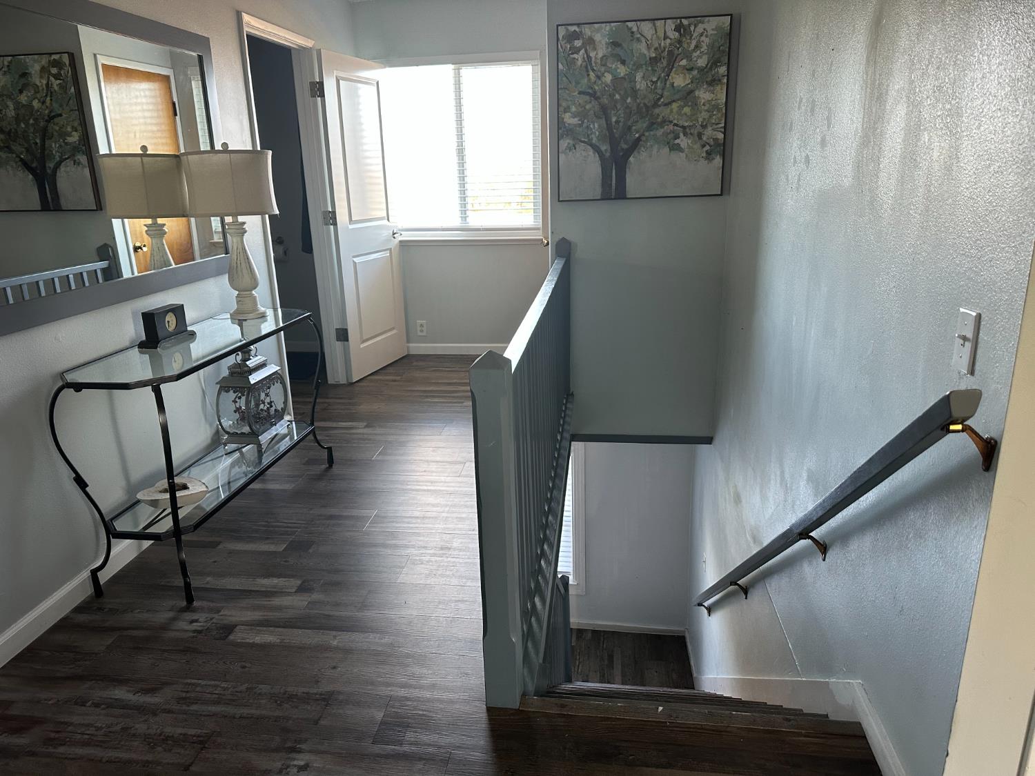 6186 Arena Way Livingston, CA 95334 - Photo 6 of 21 a view of entryway and hall with wooden floor